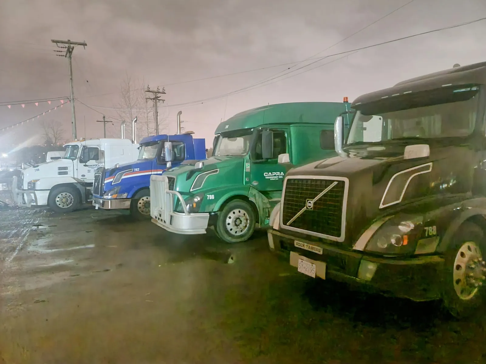 Trucks at the Capra Transport yard in Surrey, BC